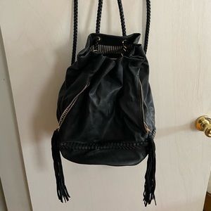 Fringe bucket backpack style purse